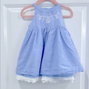 Light Blue Sleeveless Top with Embroidered Flowers